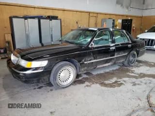✅ 1999 Mercury Grand Marquis LS • VIN: 2MEFM75W2XX639723 • Лот: 63453365. Опубликован ранее на Copart с пробегом 56 475 миль. Бесплатный доступ к архиву аукционных продаж из США и подробный отчёт об истории автомобиля на DreamBid. Изображение 1.