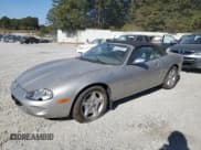✅ 1999 Jaguar XK • VIN: SAJGX2041XC040090 • Lot: 82702205. Listed on Copart with Not provided. Free auction sales archive from the USA and detailed vehicle history report at DreamBid. Image 1.