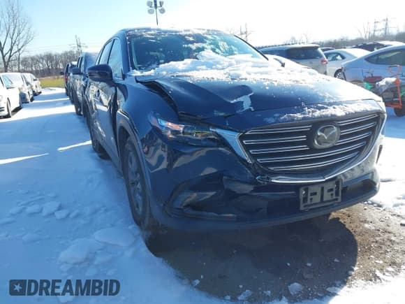 ✅ 2022 Mazda CX-9 Sport • VIN: JM3TCBBY3N0604529 • Lot: 41482183. Wystawiony na IAAI z przebiegiem 16 814 mil. Bezpłatny archiwum sprzedaży aukcyjnych z USA i szczegółowy raport historii pojazdu na DreamBid. Zdjęcie 6.