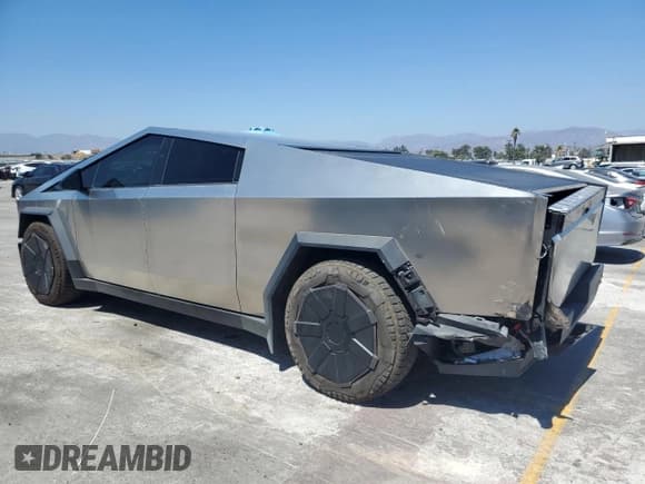 ✅ 2024 Tesla Cybertruck • VIN: 7G2CEHED2RA004553 • Лот: 69480455. Опубликован ранее на Copart с пробегом 30 315 миль. Бесплатный доступ к архиву аукционных продаж из США и подробный отчёт об истории автомобиля на DreamBid. Изображение 2.