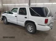 ✅ 1999 GMC Jimmy SLT • VIN: 1GKDT13W4X2541943 • Lot: 42868846. Listed on IAAI with 142,124 mi. Free auction sales archive from the USA and detailed vehicle history report at DreamBid. Image 3.