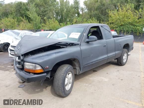 1997 Dodge Dakota with VIN 1B7GL23Y1VS158359, listed as a IAAI auction lot 43170442 with 223,703 mi miles and . Bid and sale history available at DreamBid. Image 18.