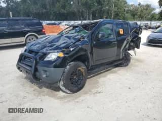 2014 Nissan Frontier Desert Runner z VIN 1N6AD0ER3EN721128, wystawiony jako Copart lot #84179015 z przebiegiem Nie podano mil oraz Nie do naprawy • Non repairable. Historia ofert i sprzedaży dostępna na DreamBid. Obrazek 1.
