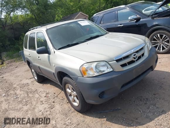 ✅ 2006 Mazda Tribute i • VIN: 4F2YZ02Z06KM13747 • Lot: 42978182. Listed on IAAI with 173,940 mi. Free auction sales archive from the USA and detailed vehicle history report at DreamBid. Image 1.