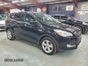 ✅ 2016 Ford Escape SE • VIN: 1FMCU9GX2GUB09907 • Lot: 94479765. Listed on Copart with 96,654 mi. Free auction sales archive from the USA and detailed vehicle history report at DreamBid. Image 4.