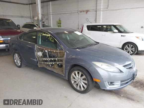 ✅ 2011 Mazda 6 i Touring • VIN: 1YVHZ8CH8B5M30433 • Lot: 42297382. Listed on IAAI with 261,637 mi. Free auction sales archive from the USA and detailed vehicle history report at DreamBid. Image 1.