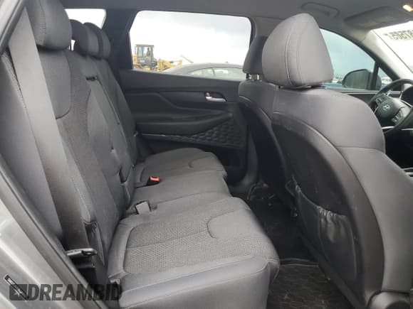 ✅ 2019 Hyundai Santa Fe SE • VIN: 5NMS2CAD8KH089843 • Лот: 80187565. Опубликован ранее на Copart с пробегом 121 064 миль. Бесплатный доступ к архиву аукционных продаж из США и подробный отчёт об истории автомобиля на DreamBid. Изображение 11.
