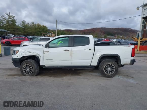 ✅ 2018 Chevrolet Colorado 4WD ZR2 • VIN: 1GCGTEEN5J1151659 • Lot: 43630954. Listed on IAAI with 122,805 mi. Free auction sales archive from the USA and detailed vehicle history report at DreamBid. Image 14.