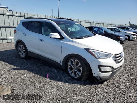 ✅ 2015 Hyundai Santa Fe Limited • VIN: 5XYZUDLA2FG258207 • Lot: 68584043. Listed on Copart with 214,993 mi. Free auction sales archive from the USA and detailed vehicle history report at DreamBid. Image 4.