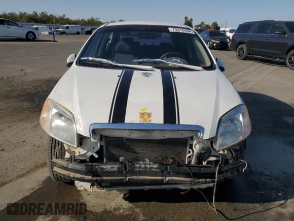 ✅ 2007 Chevrolet Aveo LS • VIN: KL1TD56697B138099 • Lot: 79316494. Wystawiony na Copart z przebiegiem 141 850 mil. Bezpłatny archiwum sprzedaży aukcyjnych z USA i szczegółowy raport historii pojazdu na DreamBid. Zdjęcie 5.