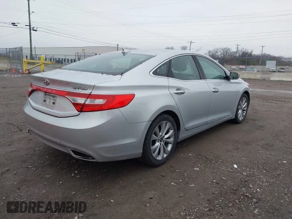 ✅ 2014 Hyundai Azera Limited • VIN: KMHFH4JG8EA365075 • Lot: 43883112. Listed on IAAI with 105,648 mi. Free auction sales archive from the USA and detailed vehicle history report at DreamBid. Image 4.