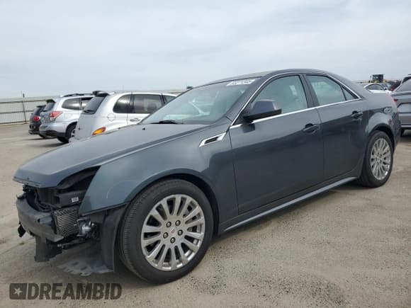 ✅ 2012 Cadillac CTS Premium • VIN: 1G6DP5E32C0113601 • Lot: 53271345. Wystawiony na Copart z przebiegiem 70 881 mil. Bezpłatny archiwum sprzedaży aukcyjnych z USA i szczegółowy raport historii pojazdu na DreamBid. Zdjęcie 1.