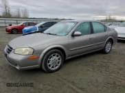 ✅ 2001 Nissan Maxima GXE • VIN: JN1CA31DX1T818870 • Lot: 93910225. Listed on Copart with 149,515 mi. Free auction sales archive from the USA and detailed vehicle history report at DreamBid. Image 1.