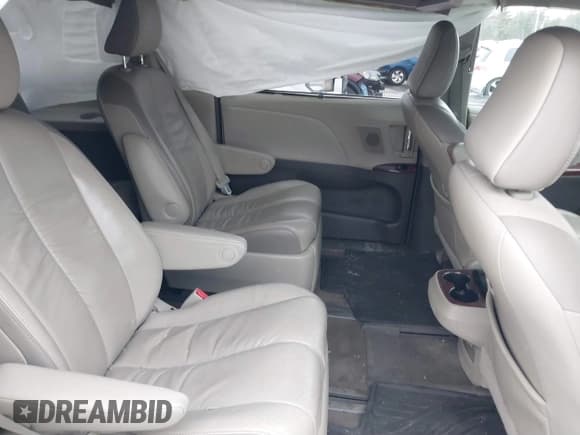 ✅ 2012 Toyota Sienna XLE • VIN: 5TDDK3DCXCS036006 • Lot: 41846007. Listed on IAAI with 188,555 mi. Free auction sales archive from the USA and detailed vehicle history report at DreamBid. Image 8.