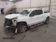 2025 Chevrolet Colorado 4WD Z71 with VIN 1GCPTDEK3S1121299, listed as a IAAI auction lot 43455862 with 2,148 mi miles and . Bid and sale history available at DreamBid. Image 2.