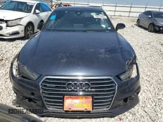 ✅ 2017 Audi A7 Premium Plus • VIN: WAUW2AFC6HN031809 • Lot: 70913865. Wystawiony na Copart z przebiegiem Nie podano. Bezpłatny archiwum sprzedaży aukcyjnych z USA i szczegółowy raport historii pojazdu na DreamBid. Zdjęcie 5.
