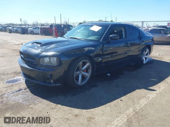 2009 Dodge Charger SRT-8 с VIN 2B3LA73WX9H560878, выставлен на аукционе IAAI как лот 41751921 с пробегом 138 596 миль миль и . История ставок и продаж доступна на DreamBid. Изображение 17.