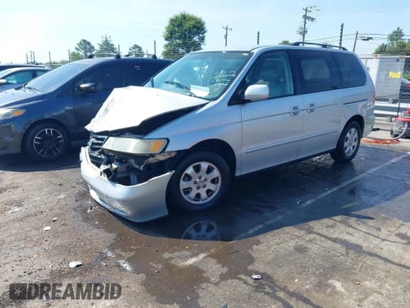 ✅ 2002 Honda Odyssey EX-L • VIN: 5FNRL18972B056495 • Lot: 42560598. Listed on IAAI with 152,774 mi. Free auction sales archive from the USA and detailed vehicle history report at DreamBid. Image 18.