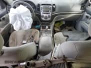 ✅ 2009 Hyundai Santa Fe GLS • VIN: 5NMSG13D69H276978 • Lot: 76225204. Listed on Copart with 178,871 mi. Free auction sales archive from the USA and detailed vehicle history report at DreamBid. Image 8.