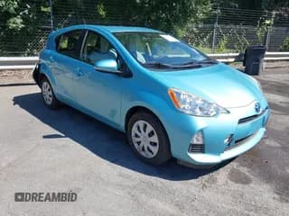 ✅ 2014 Toyota Prius One • VIN: JTDKDTB3XE1080513 • Lot: 43152390. Listed on IAAI with 94,721 mi. Free auction sales archive from the USA and detailed vehicle history report at DreamBid. Image 1.