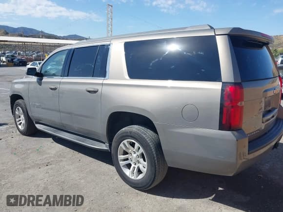 ✅ 2017 Chevrolet Suburban LS • VIN: 1GNSCGEC9HR355405 • Lot: 41674594. Listed on IAAI with 170,312 mi. Free auction sales archive from the USA and detailed vehicle history report at DreamBid. Image 3.