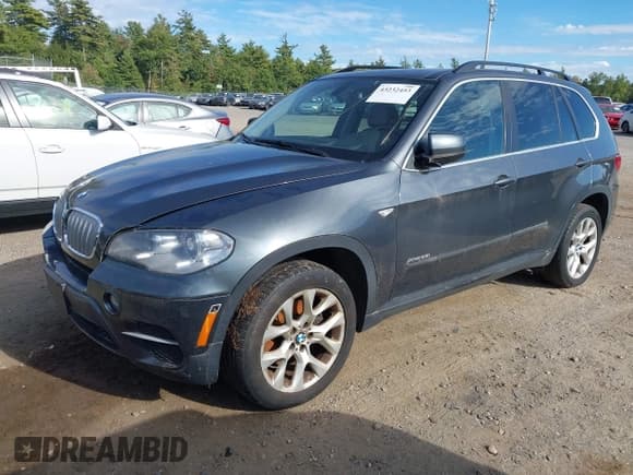 ✅ 2013 BMW X5 xDrive35i • VIN: 5UXZV4C5XD0B13128 • Lot: 43232453. Listed on IAAI with 142,298 mi. Free auction sales archive from the USA and detailed vehicle history report at DreamBid. Image 2.