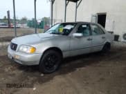 ✅ 1995 Mercedes-Benz C 2.8L • VIN: WDBHA28E5SF233687 • Лот: 43333579. Опубликован ранее на IAAI с пробегом 179 934 миль. Бесплатный доступ к архиву аукционных продаж из США и подробный отчёт об истории автомобиля на DreamBid. Изображение 2.