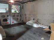 ✅ 2011 Ford Econoline Cargo Commercial • VIN: 1FTNE2EL1BDA18380 • Lot: 42647683. Listed on IAAI with 123,507 mi. Free auction sales archive from the USA and detailed vehicle history report at DreamBid. Image 8.