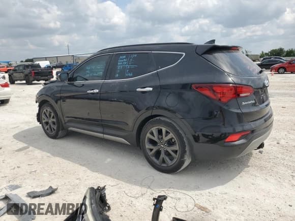 ✅ 2018 Hyundai Santa Fe Ultimate • VIN: 5NMZW4LA4JH100282 • Лот: 48676624. Опубликован ранее на Copart с пробегом 64 081 миль. Бесплатный доступ к архиву аукционных продаж из США и подробный отчёт об истории автомобиля на DreamBid. Изображение 2.
