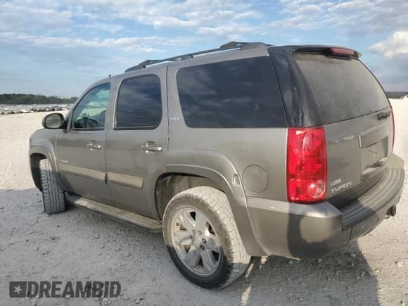 ✅ 2009 GMC Yukon SLT 4SA • VIN: 1GKFK33089R183940 • Lot: 82261835. Listed on Copart with 196,844 mi. Free auction sales archive from the USA and detailed vehicle history report at DreamBid. Image 2.