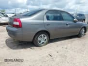 ✅ 2001 Kia Spectra GS • VIN: KNAFB161015032068 • Лот: 42474681. Опубликован ранее на IAAI с пробегом 177 465 миль. Бесплатный доступ к архиву аукционных продаж из США и подробный отчёт об истории автомобиля на DreamBid. Изображение 4.