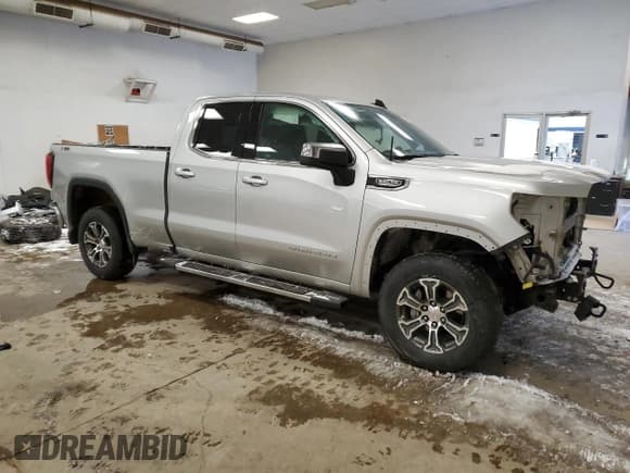 ✅ 2021 GMC Sierra 1500 SLE • VIN: 1GTR9BED1MZ304539 • Лот: 89136695. Опубликован ранее на Copart с пробегом 34 237 миль. Бесплатный доступ к архиву аукционных продаж из США и подробный отчёт об истории автомобиля на DreamBid. Изображение 4.
