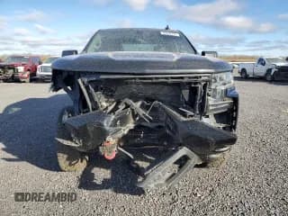 ✅ 2021 Chevrolet Silverado 1500 LT Trail Boss • VIN: 1GCPYFED5MZ440139 • Lot: 76628354. Wystawiony na Copart z przebiegiem 99 978 mil. Bezpłatny archiwum sprzedaży aukcyjnych z USA i szczegółowy raport historii pojazdu na DreamBid. Zdjęcie 5.