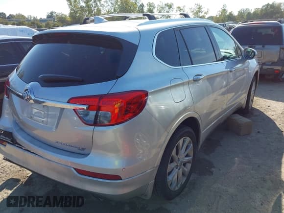 ✅ 2017 Buick Envision Premium II • VIN: LRBFXFSX4HD019396 • Lot: 43223086. Listed on IAAI with 61,310 mi. Free auction sales archive from the USA and detailed vehicle history report at DreamBid. Image 4.