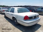 ✅ 2000 Ford Crown Victoria Police Interceptor • VIN: 2FAFP71W9YX208897 • Лот: 42597305. Опубликован ранее на IAAI с пробегом 128 699 миль. Бесплатный доступ к архиву аукционных продаж из США и подробный отчёт об истории автомобиля на DreamBid. Изображение 3.