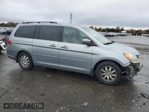✅ 2009 Honda Odyssey EX-L • VIN: 5FNRL38749B031641 • Lot: 90673625. Wystawiony na Copart z przebiegiem 223 791 mil. Bezpłatny archiwum sprzedaży aukcyjnych z USA i szczegółowy raport historii pojazdu na DreamBid. Zdjęcie 4.