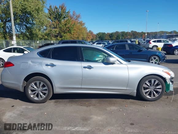 ✅ 2012 Infiniti M • VIN: JN1BY1AR3CM391021 • Lot: 43464297. Listed on IAAI with 135,930 mi. Free auction sales archive from the USA and detailed vehicle history report at DreamBid. Image 13.