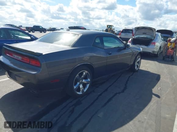 ✅ 2013 Dodge Challenger SXT • VIN: 2C3CDYAG0DH684162 • Lot: 43399757. Listed on IAAI with 113,941 mi. Free auction sales archive from the USA and detailed vehicle history report at DreamBid. Image 4.