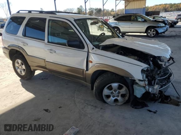 ✅ 2004 Mazda Tribute LX • VIN: 4F2YZ04184KM17467 • Lot: 84697684. Listed on Copart with 287,299 mi. Free auction sales archive from the USA and detailed vehicle history report at DreamBid. Image 4.