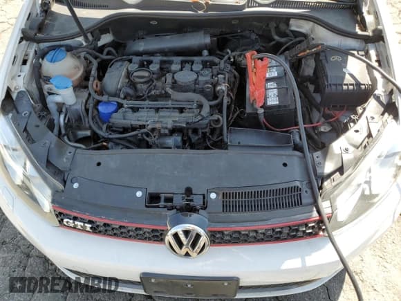 ✅ 2013 Volkswagen Golf GTI • VIN: WVWFD7AJ2DW083089 • Lot: 57421195. Listed on Copart with 93,448 mi. Free auction sales archive from the USA and detailed vehicle history report at DreamBid. Image 11.