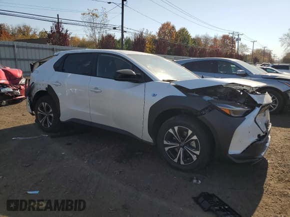 ✅ 2023 Subaru Solterra Premium • VIN: JTMABABAXPA024577 • Lot: 77157704. Listed on Copart with 11,939 mi. Free auction sales archive from the USA and detailed vehicle history report at DreamBid. Image 4.