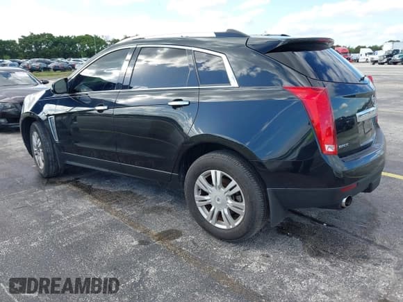 ✅ 2013 Cadillac SRX Performance Collection • VIN: 3GYFNDE32DS533577 • Lot: 43584930. Listed on IAAI with 127,016 mi. Free auction sales archive from the USA and detailed vehicle history report at DreamBid. Image 3.