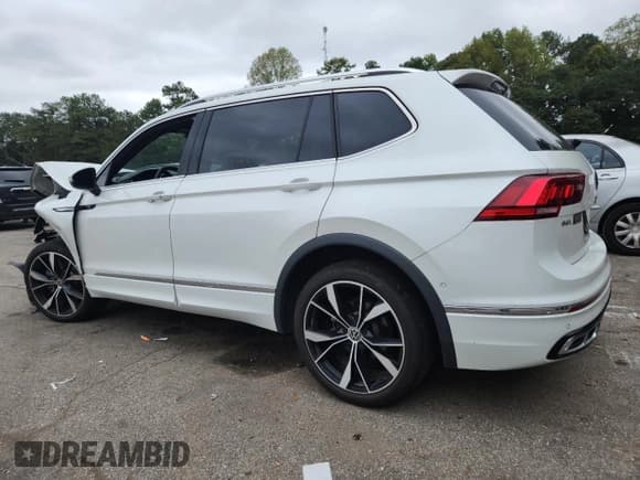 ✅ 2023 Volkswagen Tiguan SEL R-Line • VIN: 3VV4B7AXXPM029983 • Лот: 84759205. Опубликован ранее на Copart с пробегом 23 925 миль. Бесплатный доступ к архиву аукционных продаж из США и подробный отчёт об истории автомобиля на DreamBid. Изображение 2.