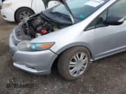 ✅ 2011 Honda Insight LX • VIN: JHMZE2H52BS009826 • Лот: 43724404. Опубликован ранее на IAAI с пробегом 172 491 миль. Бесплатный доступ к архиву аукционных продаж из США и подробный отчёт об истории автомобиля на DreamBid. Изображение 6.