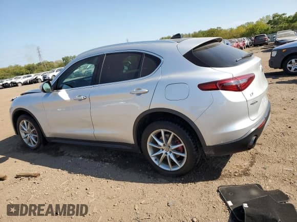 ✅ 2018 Alfa Romeo Stelvio Ti • VIN: ZASFAKBN0J7C21979 • Lot: 84944595. Listed on Copart with 92,192 mi. Free auction sales archive from the USA and detailed vehicle history report at DreamBid. Image 2.