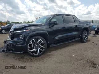 ✅ 2024 Chevrolet Silverado EV RST • VIN: 1GC40ZEL0RU303018 • Лот: 62183615. Опубликован ранее на Copart с пробегом 2 291 миль. Бесплатный доступ к архиву аукционных продаж из США и подробный отчёт об истории автомобиля на DreamBid. Изображение 1.