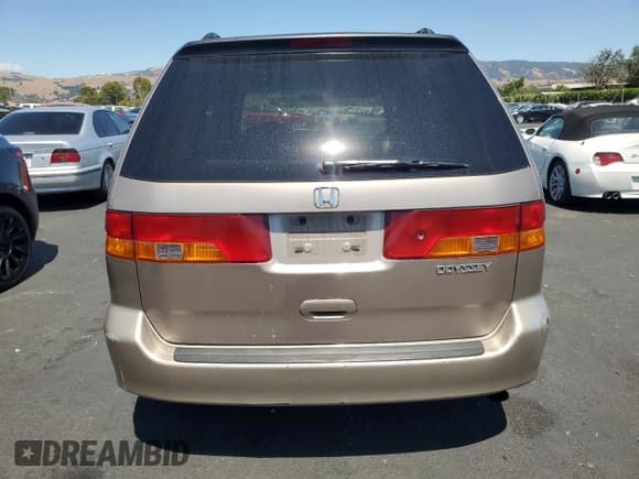 ✅ 2004 Honda Odyssey EX-L • VIN: 5FNRL18764B074729 • Lot: 66571035. Listed on Copart with 179,351 mi. Free auction sales archive from the USA and detailed vehicle history report at DreamBid. Image 6.