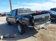 ✅ 2015 Toyota Tacoma • VIN: 3TMLU4EN2FM169326 • Lot: 40689500. Listed on IAAI with 77,003 mi. Free auction sales archive from the USA and detailed vehicle history report at DreamBid. Image 3.