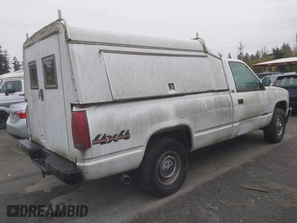 1994 Chevrolet Silverado 1500 z VIN 1GCEK14Z9RZ113856, wystawiony jako IAAI lot #43573290 z przebiegiem 247 761 mil mil oraz . Historia ofert i sprzedaży dostępna na DreamBid. Obrazek 4.