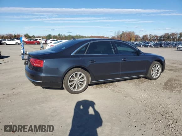 ✅ 2014 Audi A8 3.0T • VIN: WAURGAFDXEN012098 • Lot: 90955265. Listed on Copart with 90,630 mi. Free auction sales archive from the USA and detailed vehicle history report at DreamBid. Image 3.